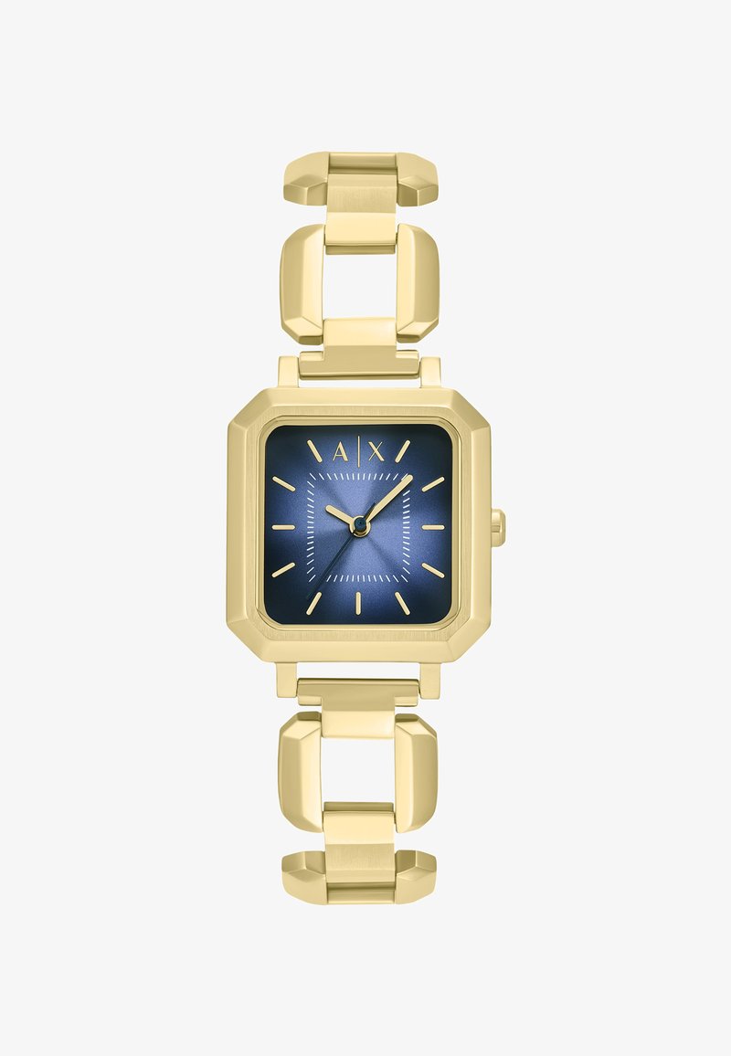 Orologio in metallo color oro con cassa quadrata, quadrante blu navy, indicatori delle ore e bracciale a maglia decorata. Presenta accenti audaci e una finitura lucida.