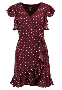 Robe portefeuille bordeaux à pois blancs, décolleté en V, manches courtes volantées, ourlet à volants et détail de nouage sur le côté.