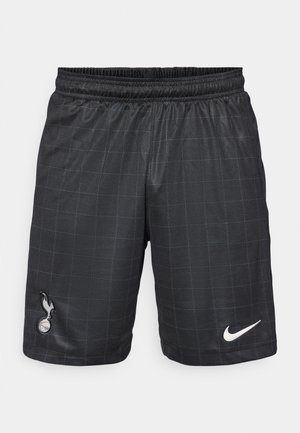 Sorte treningsshorts med rutemønster, elastisk midje, med Nikes hvite logo og et Spurs-emblem i svart på nederste venstre side.