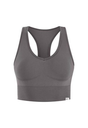Brassière de sport grise sans couture avec un design dos nageur, larges bretelles et bande côtelée pour le maintien, présentée sur fond blanc.