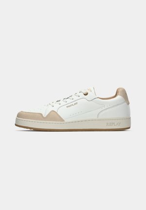 Low-top white sneaker with beige suede accents, rubber sole, and "REPLAY" branding on side, heel, and tongue.