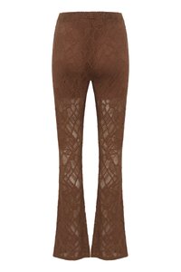 Pantaloni a campana marroni in pizzo con un motivo testurizzato, dotati di una vita alta e un design semitrasparente, che mette in risalto dettagli elaborati in openwork.