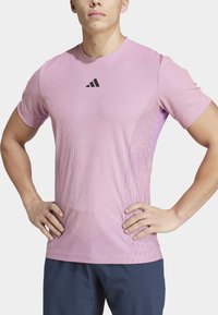 adidas Performance TENNIS PRO AIRCHILL FREELIFT - Potiskana majica - semi pink spark/preloved purple