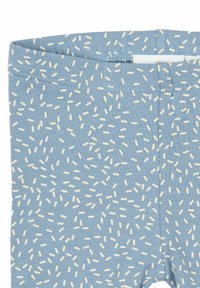 Šviesiai mėlynos leggings su baltu žaismingu geometriniu raštu. Pagaminti iš minkštos, tamprios medžiagos su elastinga juosmens juosta patogumui.