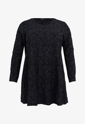 Black long-sleeve dress with textured floral pattern, round neckline, and loose fit. Made of soft, lightweight fabric.