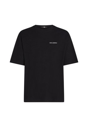 T-shirt negru din bumbac cu guler rotund și mâneci scurte; partea din față prezintă un mic patch alb cu logo-ul "KARL LAGERFELD." Design simplu.