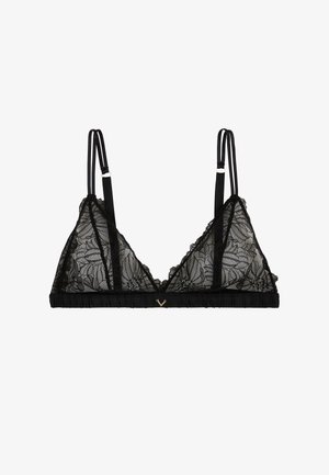Bralette en dentelle noire avec bretelles réglables, présentant un motif floral, un décolleté en V et une bande froncée en bas. Détail en accent doré inclus.