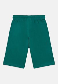 Short en coton bleu sarcelle avec taille élastique, coupe décontractée et ourlet droit. Texture lisse sans motifs ni accents visibles.