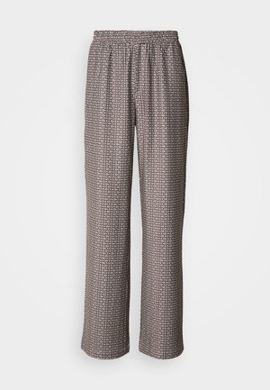 Pantalons larges en tissu léger, présentant un motif géométrique noir et blanc avec une taille élastique.