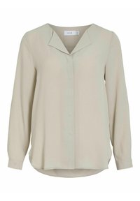 Blusa beige a maniche lunghe con patta dei bottoni nascosta, colletto a V e orlo leggermente arrotondato.