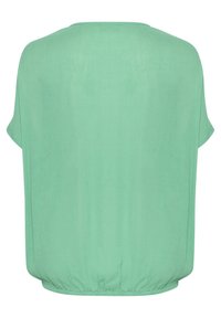 Mintgrøn kortærmet top med en løs pasform, der har en rund halsudskæring og elastisk kant for en struktureret form. Glat tekstur.