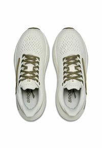 White running shoes with a textured mesh upper, olive green laces, and subtle branding on the tongue and side. Lightweight design.