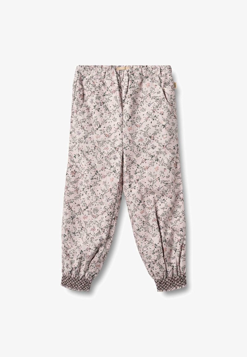 Jasnoróżowe spodnie w kwiaty z elastycznym paskiem i marszczonymi mankietami. Posiadają małe zielone i różowe wzory kwiatowe w całej powierzchni. Miękka tekstura materiału.