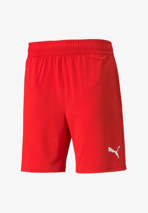 Shorts athletic rossi con una finitura testurizzata, dotati di un elastico in vita e di un logo bianco sul lato sinistro. Design leggero e casual.