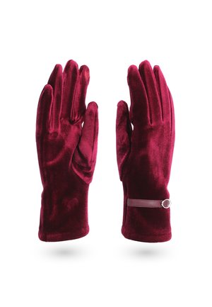 Guanti in velluto bordeaux con una texture liscia, design aderente e un cinturino sottile con un dettaglio circolare.