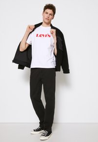 Levi's® XX CHINO EZ TAPER II - Calças - meteorite