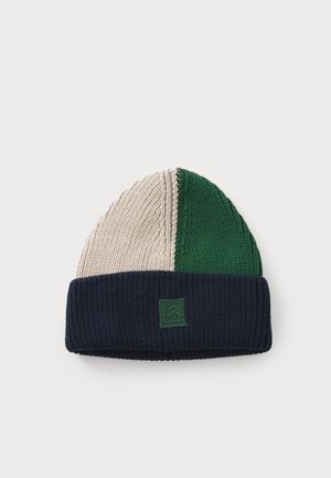 Knitted beanie featuring three sections in beige, green, and navy blue, with a folded ribbed cuff and a green logo patch.