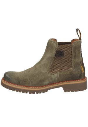 Botte Chelsea en daim vert olive avec panneaux latéraux élastiques texturés, languette de tirage marron, semelle cousue et semelle extérieure en caoutchouc robuste à crampons.