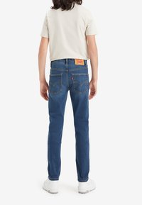 Levi's® ECO WAR - Jeans slim fit - garland