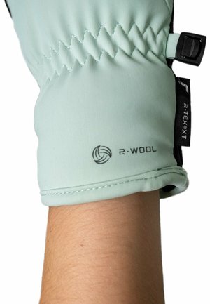 Mintgrüner wasserdichter Handschuh mit engem Bündchen, der schwarze Akzente und R-WOOL Branding aufweist. Die Oberflächenstruktur ist glatt mit genähten Details.