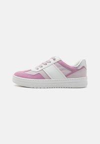 Pink and white sneakers featuring a textured upper, smooth white leather accents, and a raised silver heel, with a rubber sole.