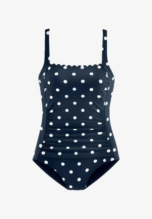 Marineblå badedragt med polkaprikkede hvide pletter, justerbare stropper, samlede side detaljer og bølget halsudskæring, lavet af glat, strækbart stof.