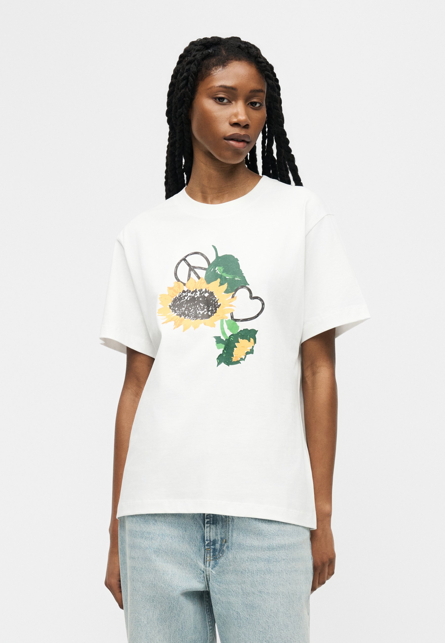 MOSCHINO JEANS グラフィックTシャツ MOSCHINO JEANS グラフィック Tシャツ | ブラック | FARFETCH JP
