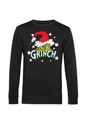 Sort langærmet sweater med en tegneserie Grinch iført en rød julehue, grafisk tekst "GRINCH" i grøn, omkranset af hvide stjerner.