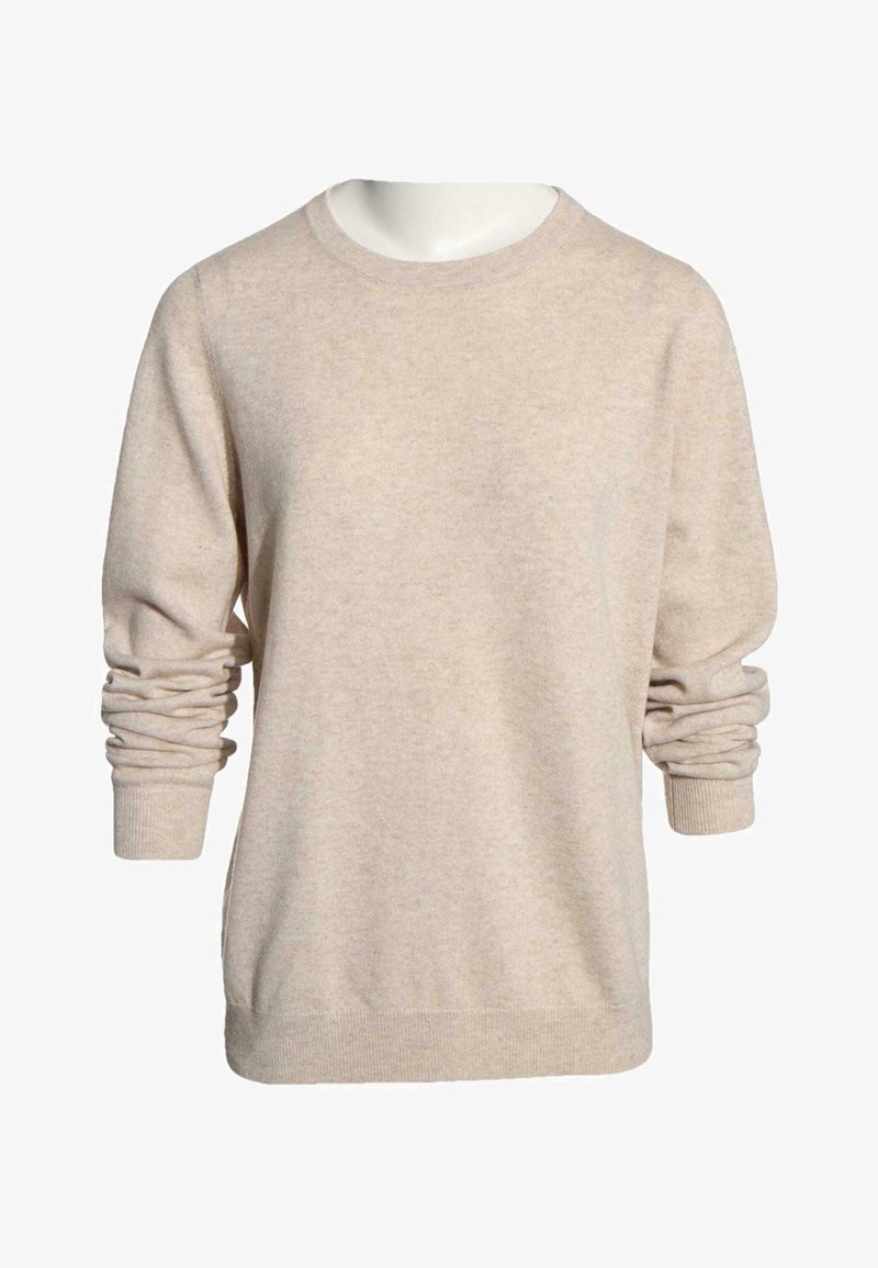Pull en maille beige à manches longues avec col rond et poignets côtelés, présenté sur un buste de mannequin blanc avec des manches légèrement froncées.