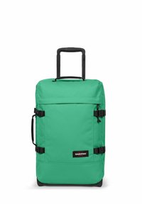 Zelený textilní kufr s teleskopickou rukojetí, černými akcenty, postranními sponami a logem na přední straně. Hladký, strukturovaný design.