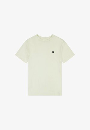 T-shirt a maniche corte verde chiaro realizzato in tessuto morbido. Presenta un piccolo logo nero nella zona del petto. Design classico con scollo a girocollo.