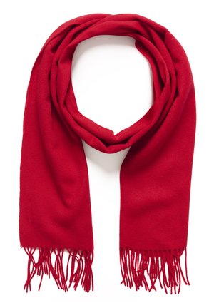 Kirkas punainen villahuivi, jossa on liehuvat reunat, löysästi taiteltuna silmukaksi valkoista taustaa vasten.