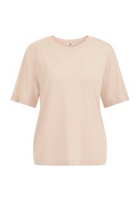 Světle béžové tričko vyrobené z měkké tkaniny, s kulatým výstřihem, krátkými rukávy a volným střihem. Minimalistický design, žádné vzory.