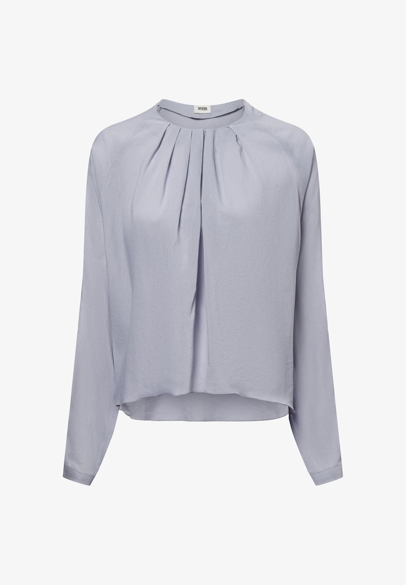 Light purple long-sleeve blouse with round neckline and vertical pleats at the front center, showing a slightly curved hem.