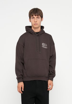 Dark grey hooded sweatshirt with a front pocket, drawstring hood, and printed logo on the chest. Made from soft, textured fabric.