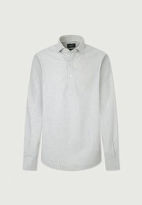 Polo a maniche lunghe grigio chiaro con un motivo a quadri testurizzati, patta con tre bottoni e polsini leggermente svasati. Realizzato in tessuto traspirante.