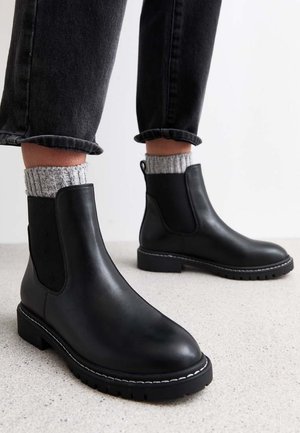 Klassiset nilkkurit - black