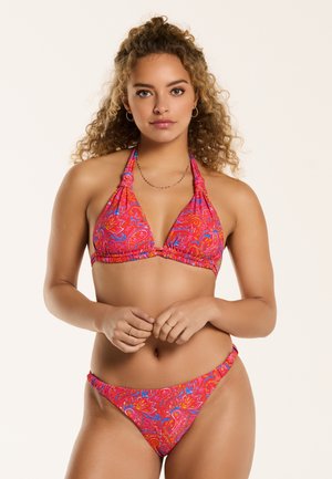 Bikini set featuring a halter-style top and matching bottoms, made of fabric with a vibrant red, pink, and blue paisley pattern.