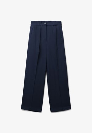 Pantaloni blu navy a gamba larga con texture a righe verticali, tasche frontali e chiusura con un bottone in vita.