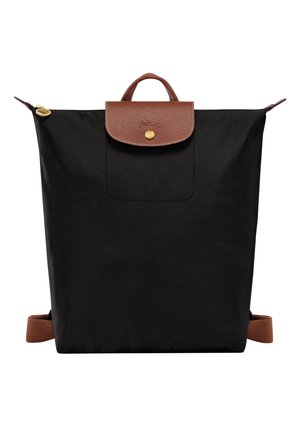 Black nylon backpack with brown leather accents. Features a top handle, front pocket, and adjustable straps. Gold-tone hardware detail.