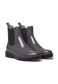 Botas Chelsea impermeables grises con acabado brillante, paneles laterales elásticos y suelas de goma negra texturizada para tracción.