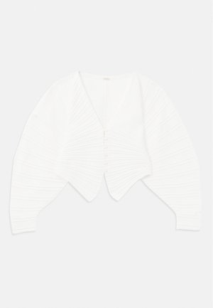 Hvid cropped cardigan lavet af ribbet stof, med en dyb V-hals, knaplukning foran og puffede ærmer med tekstureret detaljering.