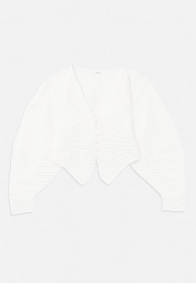 White cropped cardigan made of ribbed fabric, featuring a deep V-neckline, button front closure, and puffed sleeves with textured detailing.