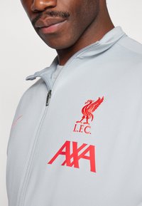 Nike Performance LIVERPOOL FC NIKE DF ACADEMY TRACK JACKET K THIRD - Klubbklær - light smoke grey/chrome yellow/global red