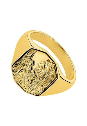 Anillo de sello en tono dorado con forma hexagonal, que presenta una escena tropical grabada con palmeras y elementos arquitectónicos. Acabado suave.