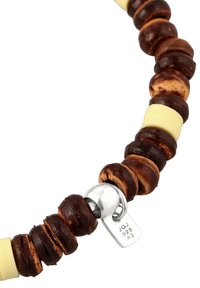 Bracelet à perles composé de disques alternés en bois brun et en céramique jaune, avec un fermoir en argent marqué "925" indiquant une qualité en argent sterling.