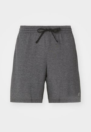 Dark gray athletic shorts made of lightweight fabric, featuring an elastic waistband with black drawstring, and a small logo on the lower side.