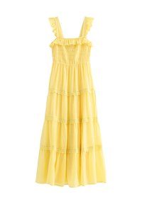 Vestido de verano amarillo sin mangas con tirantes fruncidos, cuerpo fruncido y falda de volantes con detalle de encaje.