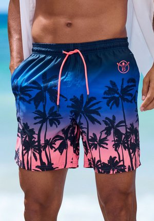 Men's swim trunks featuring a blue to pink gradient, black palm tree silhouette print, and neon pink drawstring with a logo detail.