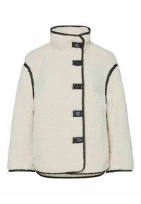 Fløyelsjakke i kremfarge med høy krage, fem svarte knapper og kontrasterende mørk kant langs sømmene. Myk tekstur, oversized passform.